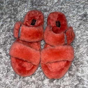 Fuzzy coral slip on UGG’s, in amazing condition and barely worn!